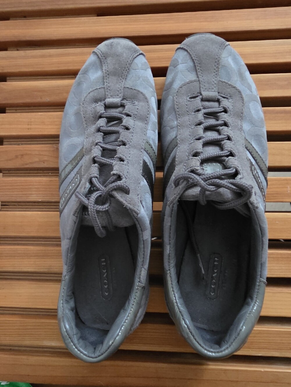 Coach Women's Kathleen sneakers feature the iconic grey signature "C" jacquard